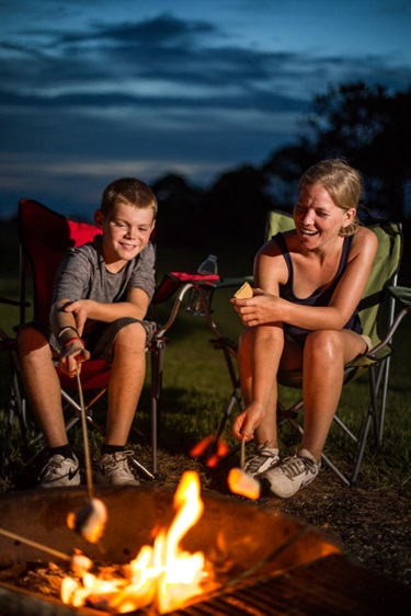 Family enjoying the bonfire