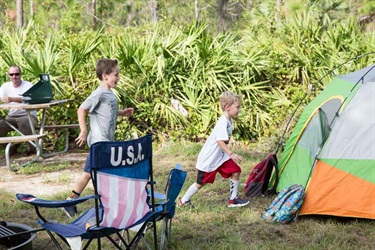 Kids running into tent