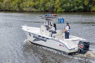 Marine Unit Boat heading out into the river