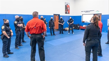 Instructor teaching class to group of participants