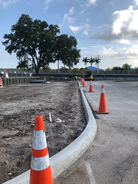 July 2020 - finishing touches at bridge plaza curbing sidewalks railing landsaping signage