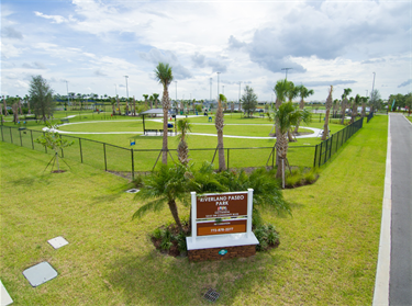 Riverland Paseo Park sign and entrance