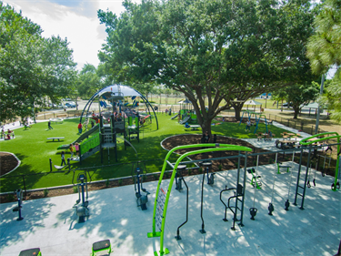 Whispering Pines Park playground and fitness stations