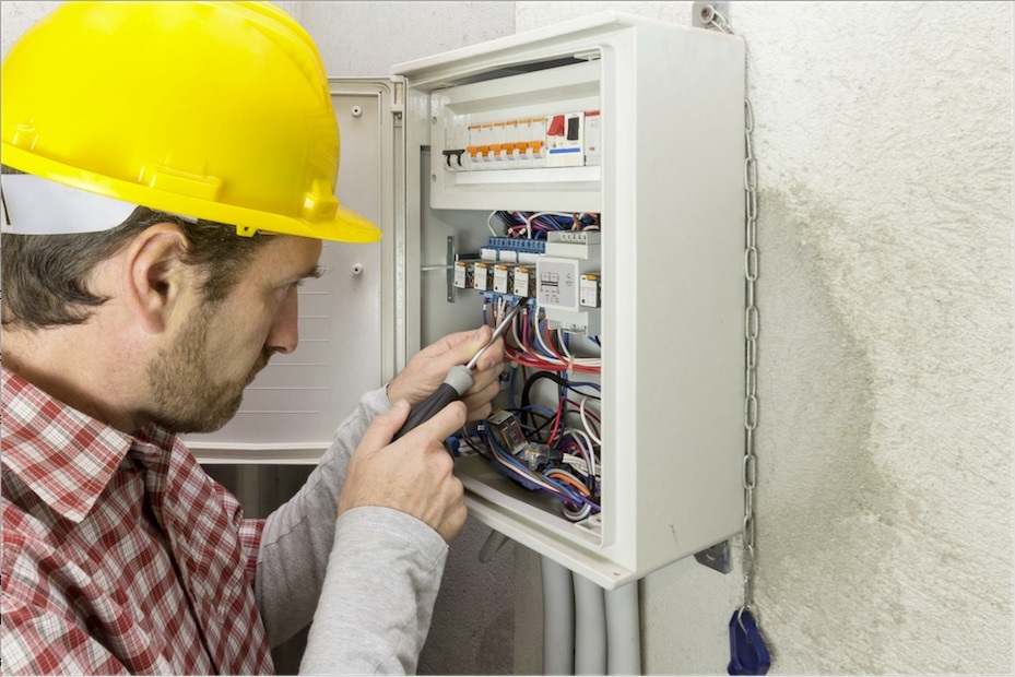 electrician opening electrical panel