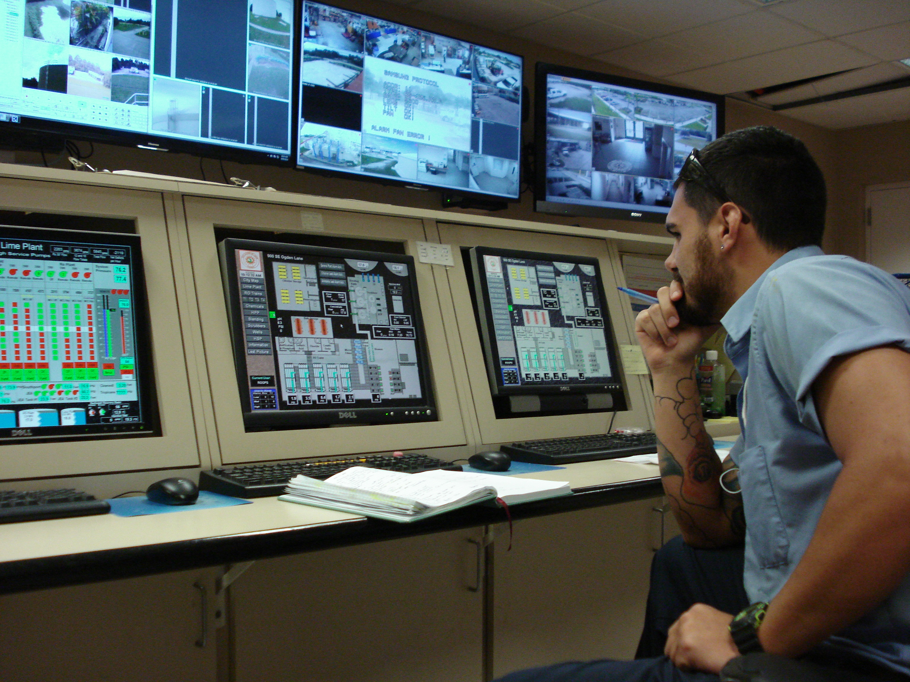 employee operating SCADA system