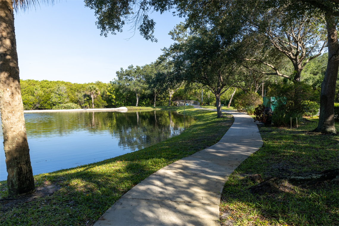 Tom Hooper Park sidewalk along lake