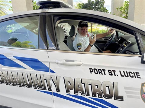 Community Patrol volunteer in car