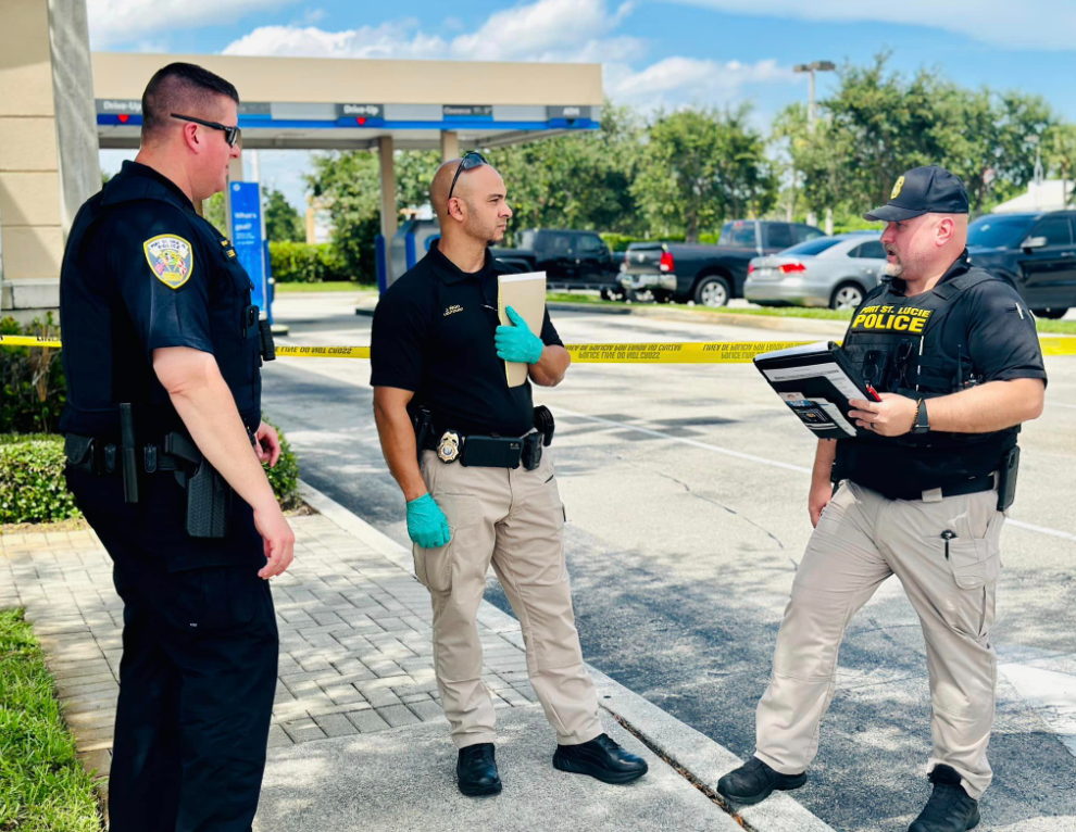 Criminal investigation division officers at a bank