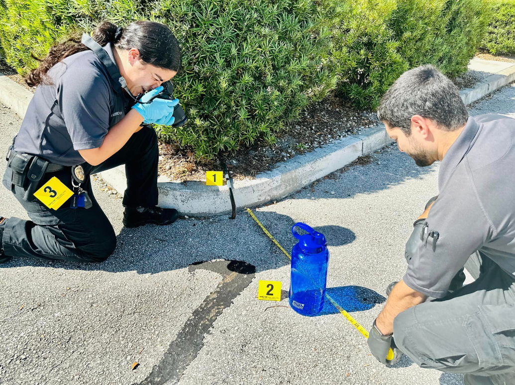 Criminal special investigation officers examining area