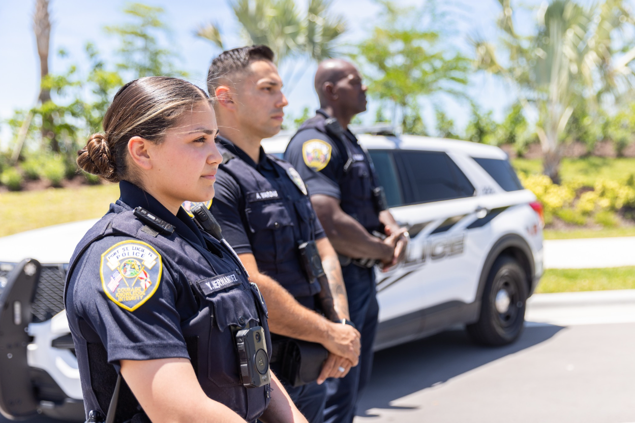 Police Recruitment officers standing